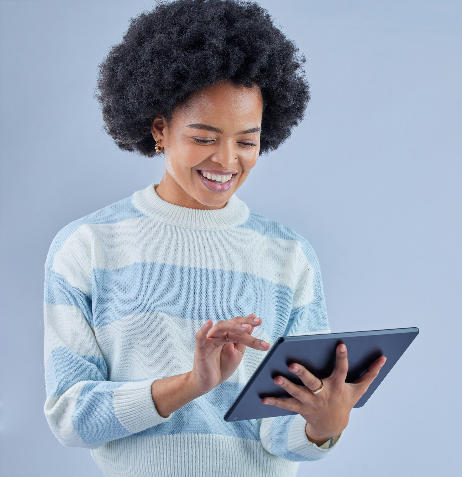 Woman, tablet and smile on studio background for social media post, reading ebook and search websit
